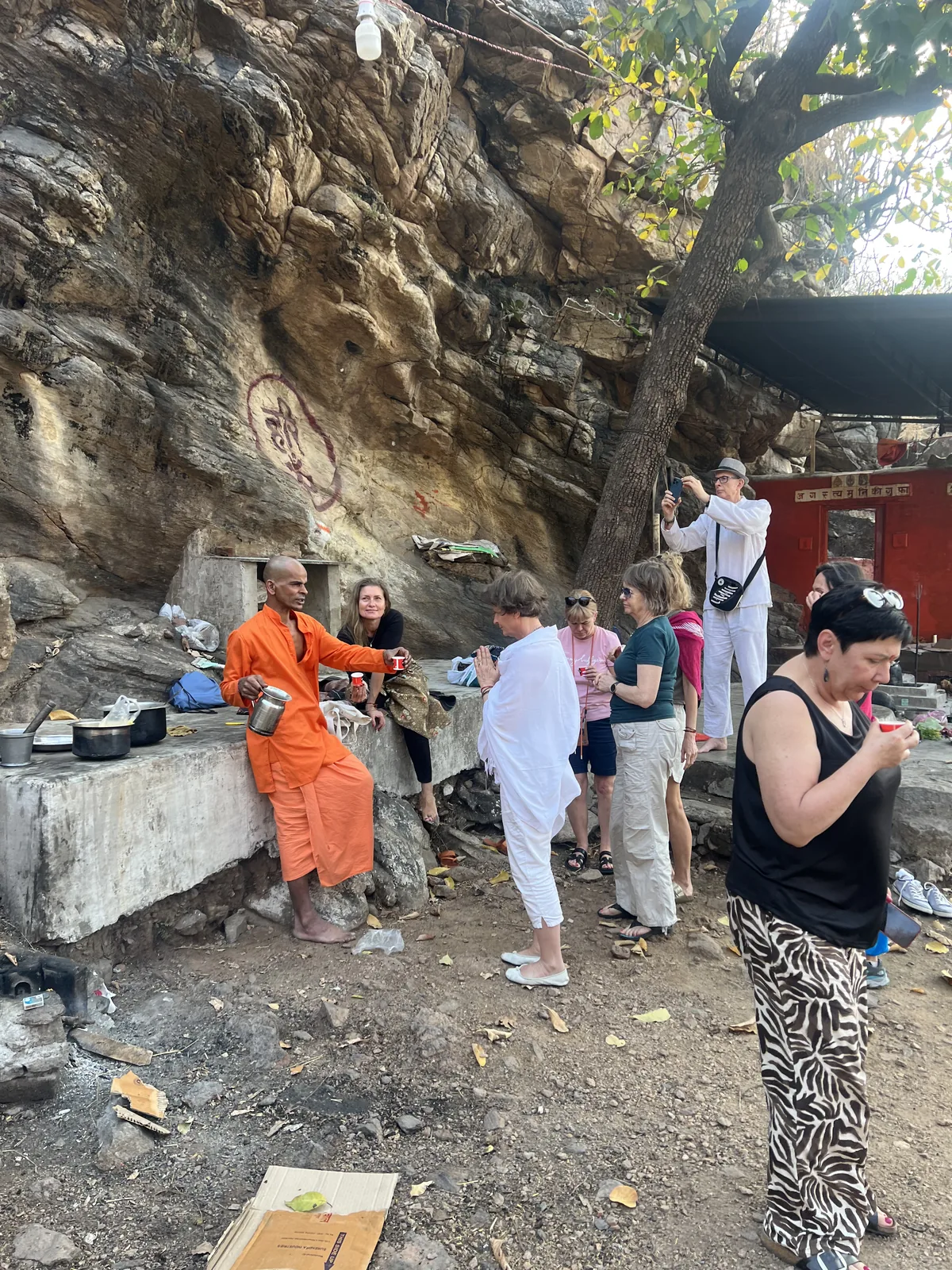 Visitors prepare food together at Augustya Muni Cave