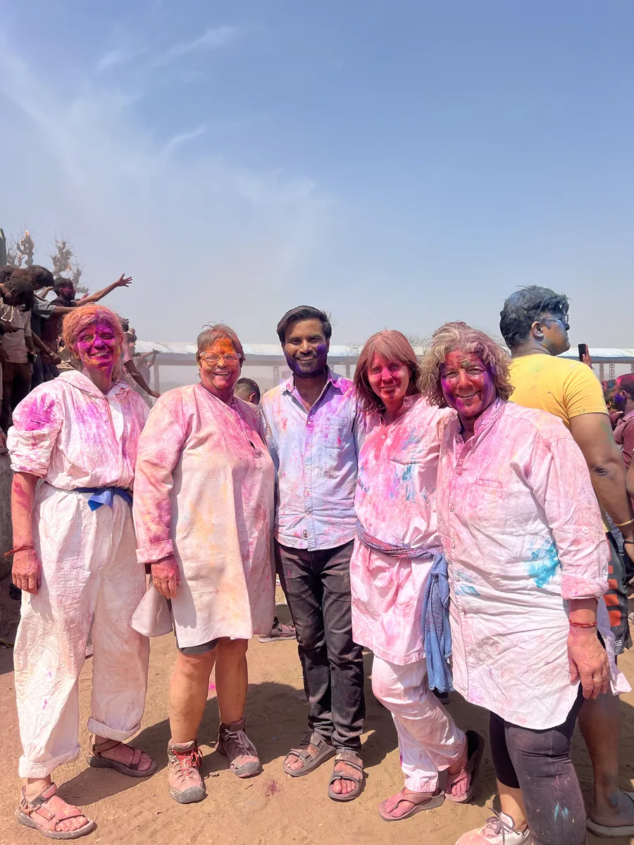 Friends gather after celebrating Holi in Pushkar